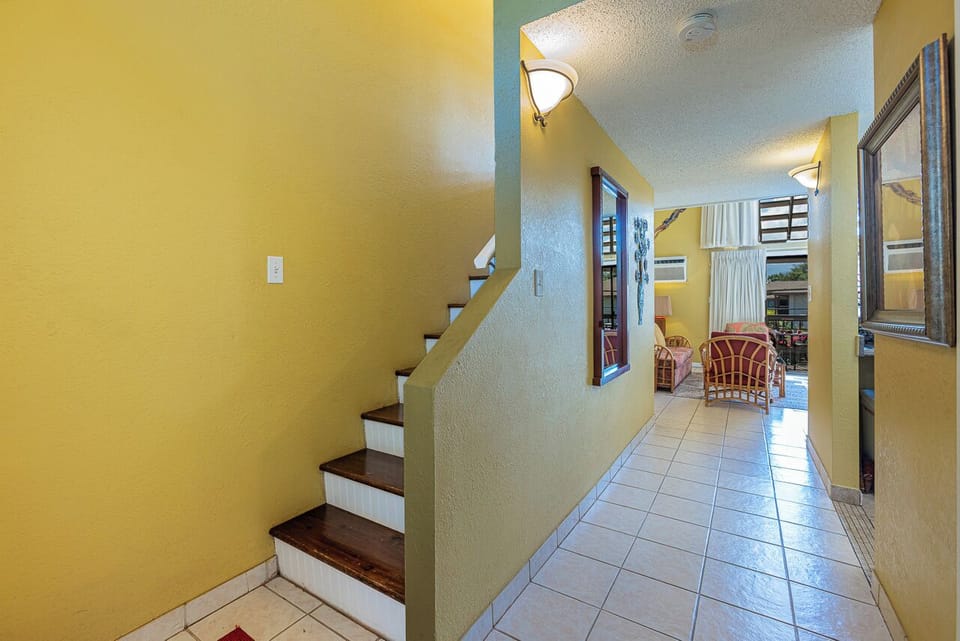 Welcoming entry with easy access to the kitchen and loft stairs