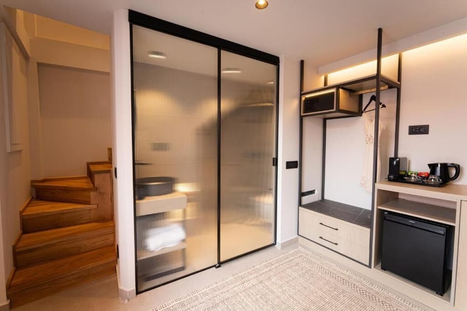 Superior Double Room, Split Level, Back Yard | Bathroom | Shower, hair dryer, towels, soap