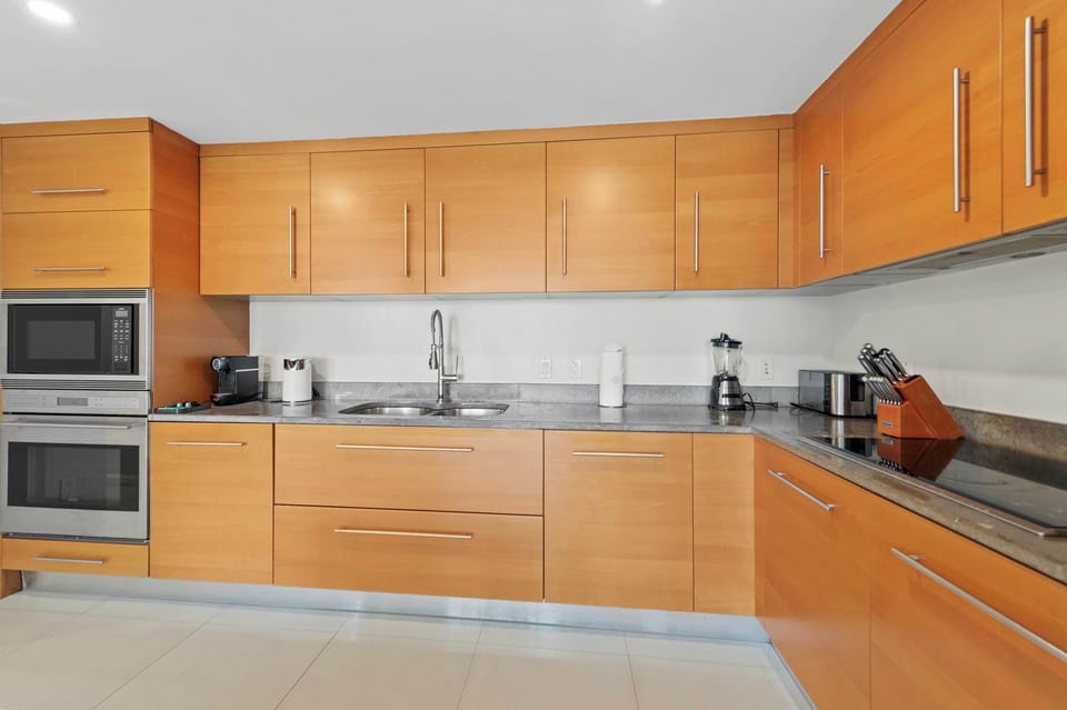 Warm wood-toned kitchen cabinetry.