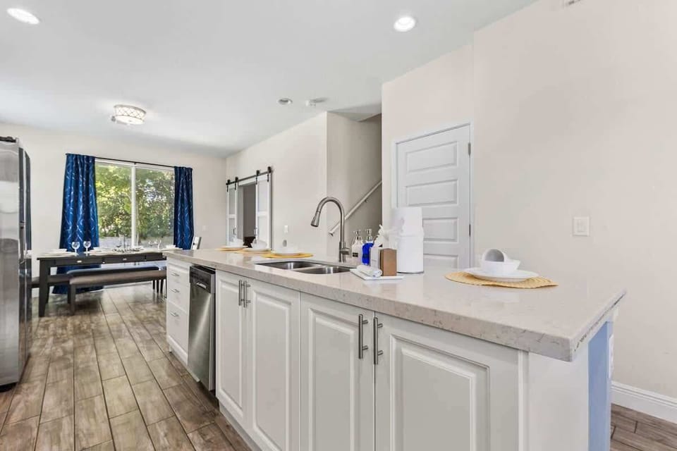 Bright open kitchen with large island and seating for easy family meals.