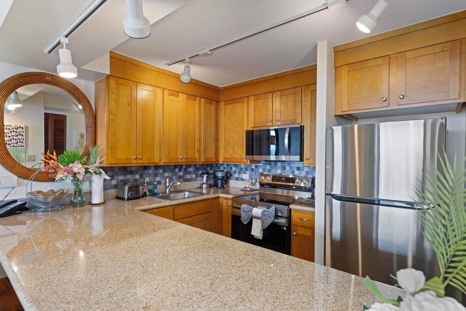 Modern kitchen with stainless steel appliances