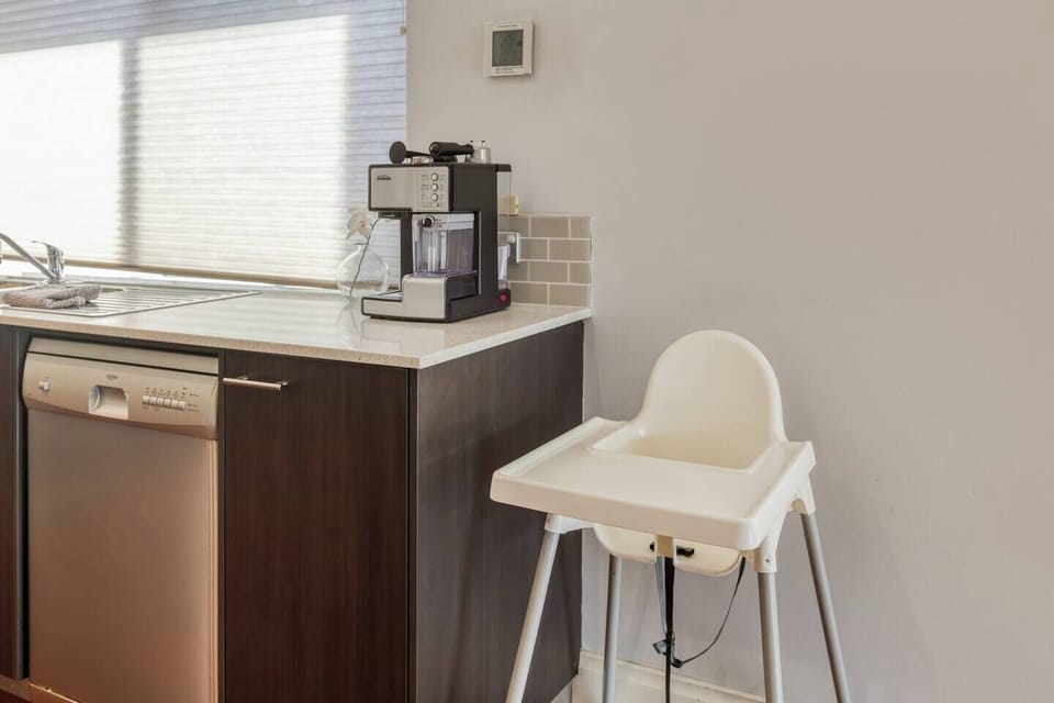 Whip up your morning coffee using the espresso machine. For those travelling with small children, a high chair is available for use.