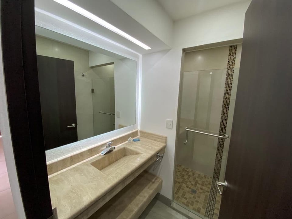 Shower, free toiletries, towels, soap