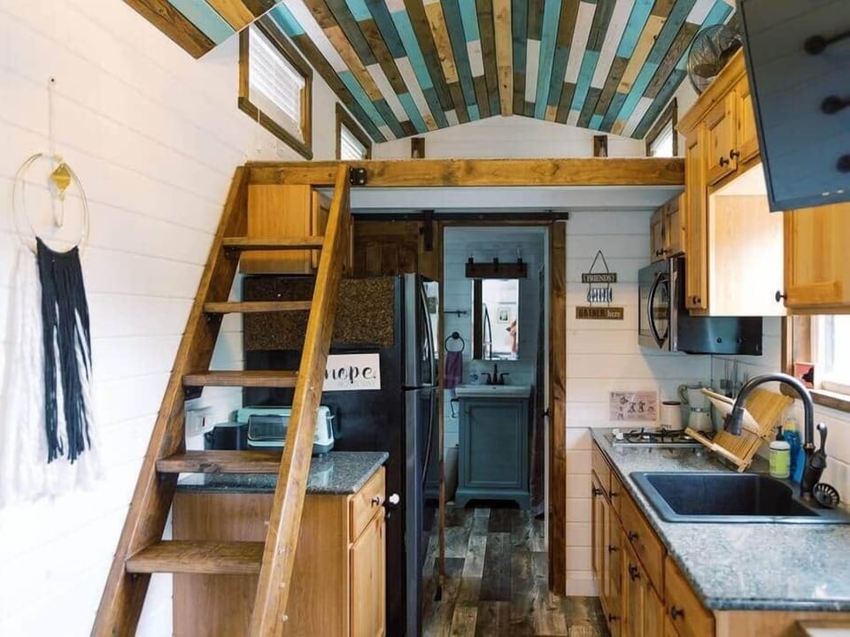 Full size appliances in the kitchen -- but no conventional oven.