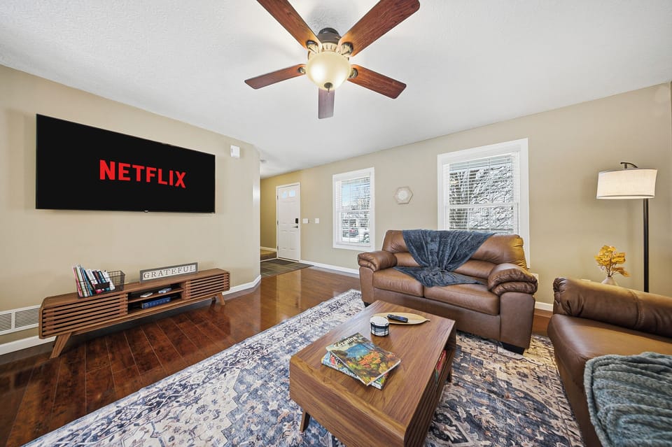 Open Living Room with 65" Smart TV for entertaining
