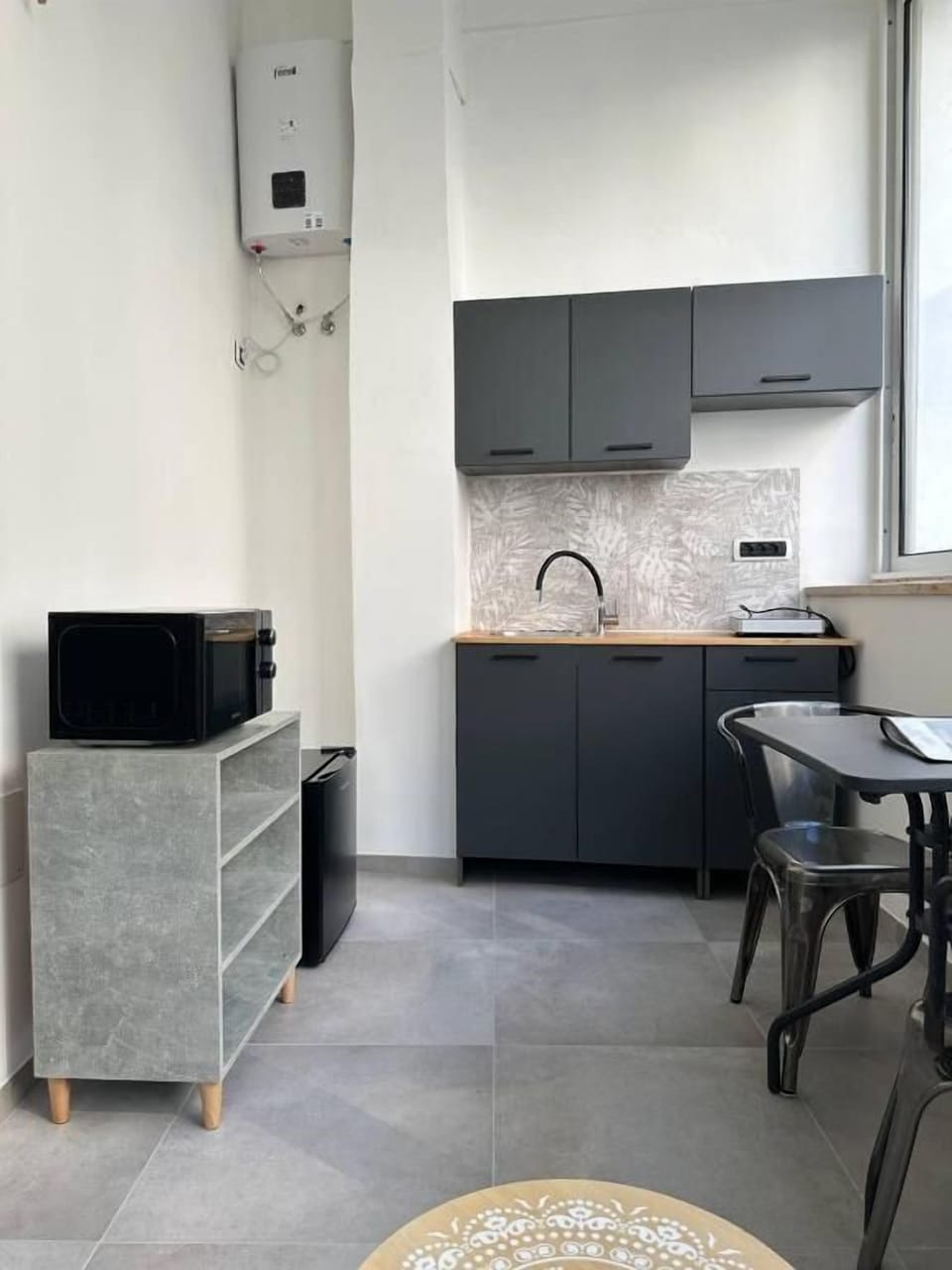 Double Room, Courtyard View | Private kitchen | Electric kettle