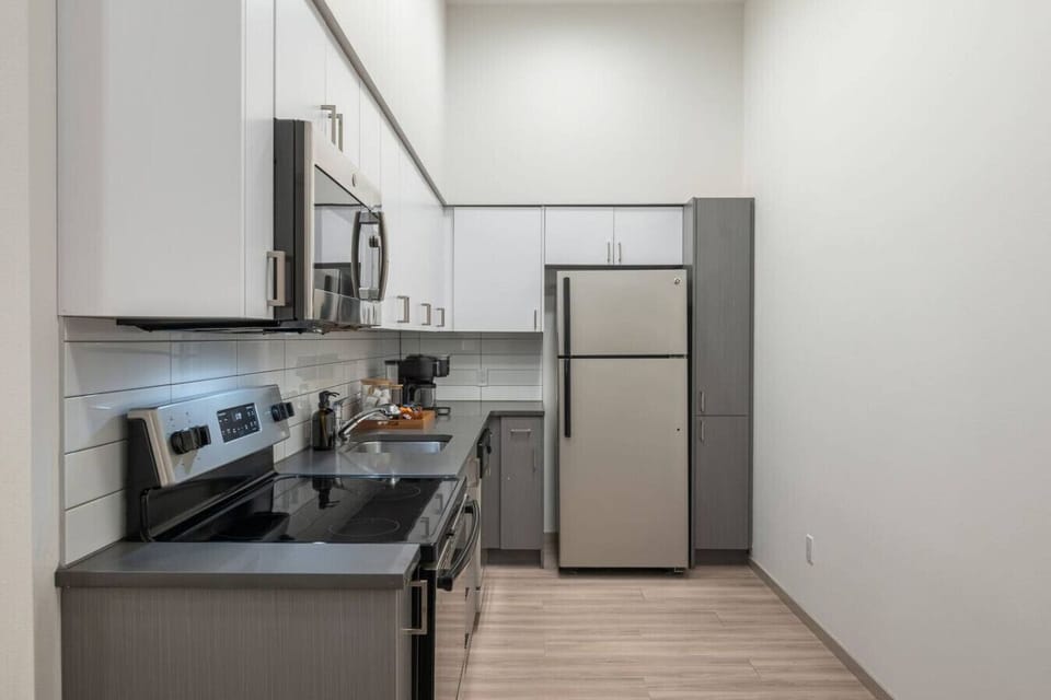 Cook with ease in this sleek, fully equipped kitchen.