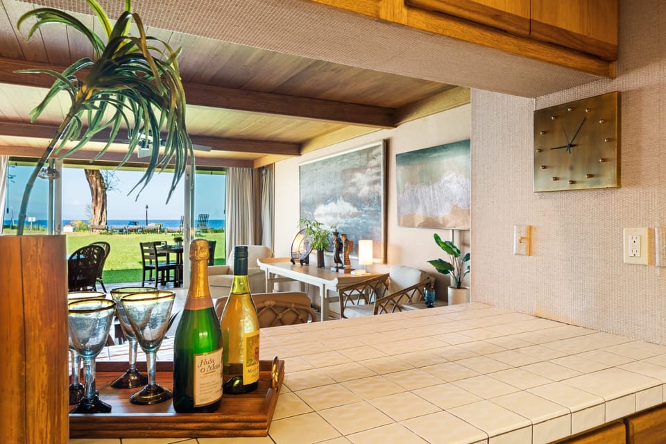 Serve drinks or snacks with ease from this ocean‑view kitchen bar
