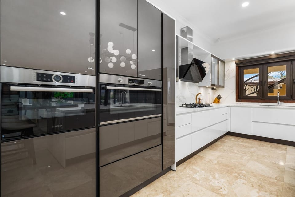 Enjoy the convenience and style of our fully equipped, designer kitchen. Featuring premium appliances, ample storage, and a bright, inviting atmosphere for all your culinary needs. Perfect for extended stays or a quick bite!