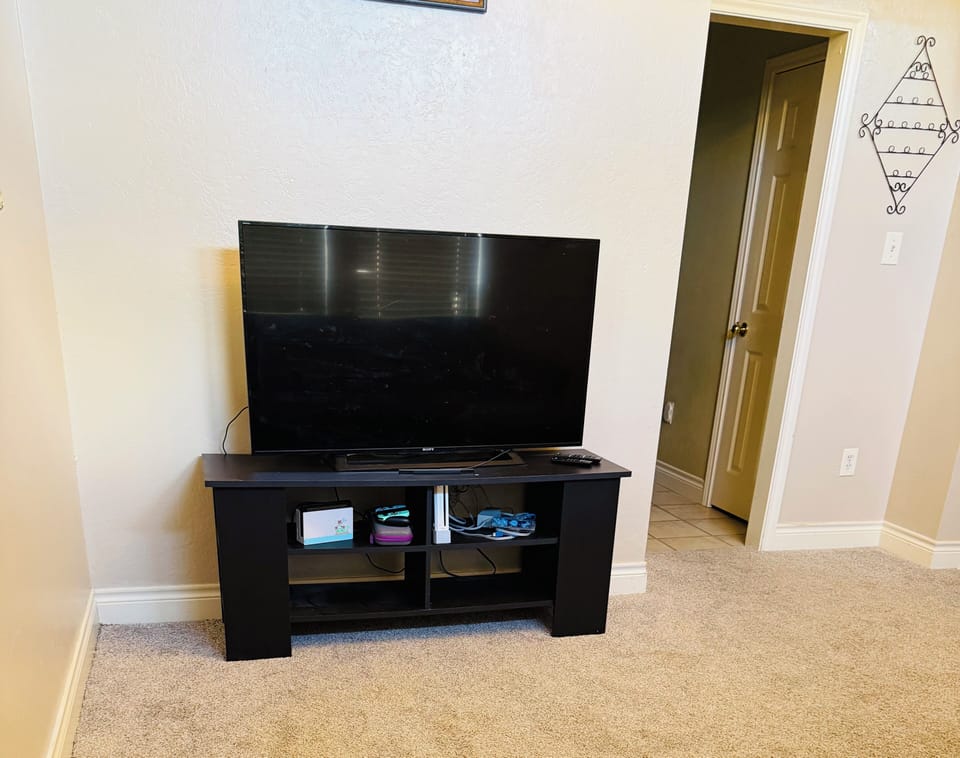 Second living space with sleeper sofa and TV with Wii and Nintendo switch 