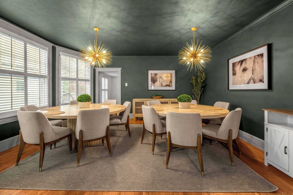 Pull ten chairs together and toast the trip with everyone you came with — plenty of seats for one long dinner instead of splitting into two.
