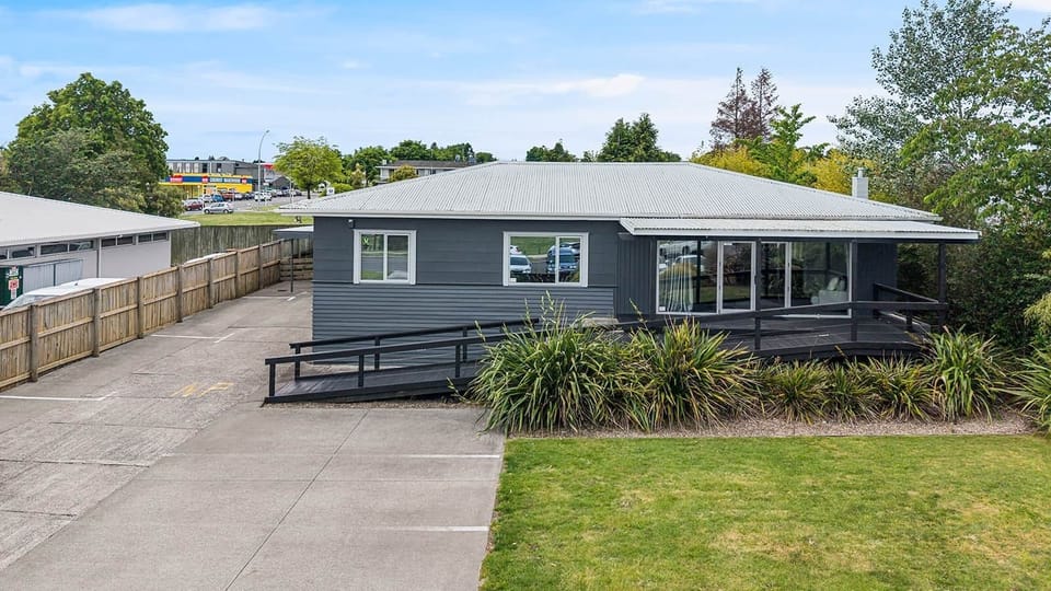 Tinted windows offer privacy and a calm feel on this quiet Taupō cul-de-sac.