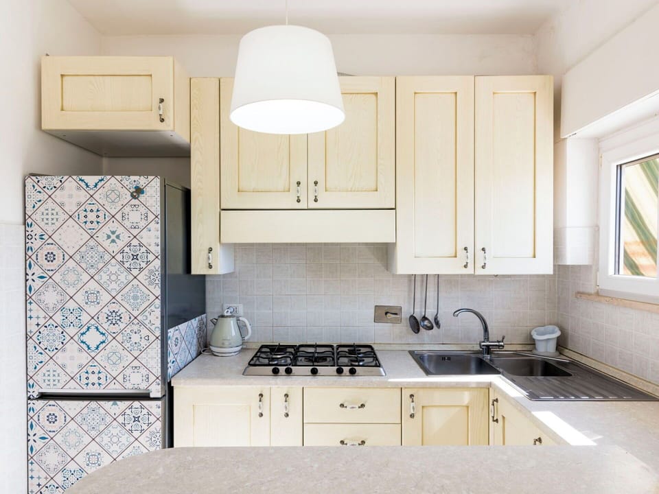 Kitchen, Kitchen Appliance, Countertop, Major Appliance, Cabinetry, Flooring, Interior Design, Wood, Furniture, Kitchen Stove