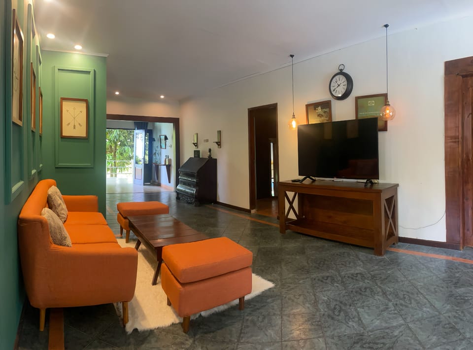 Family Villa, Balcony | Living area | Books