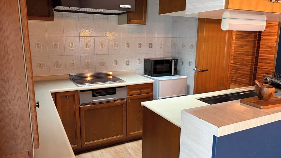 Triple Room | Private kitchenette | Full-size fridge, microwave, rice cooker, cookware/dishes/utensils