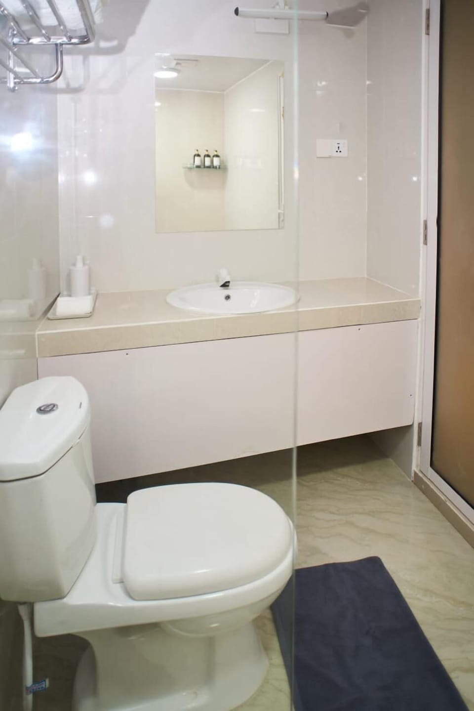 Shower, slippers, towels, soap