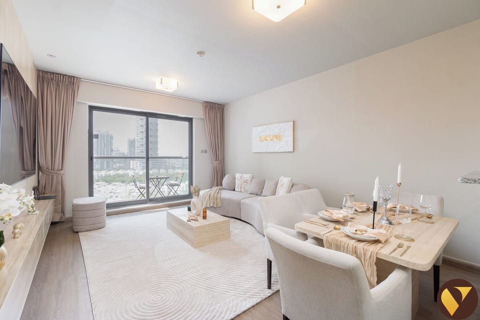 Luxury Apartment, Balcony, City View | Living area | 65-inch Smart TV with satellite channels