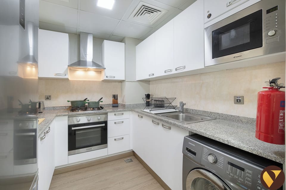 Luxury Apartment, Balcony, City View | Private kitchen | Full-size fridge, microwave, oven, stovetop