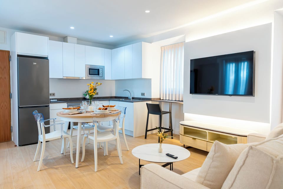 Apartment, Balcony, City View | Living room | TV