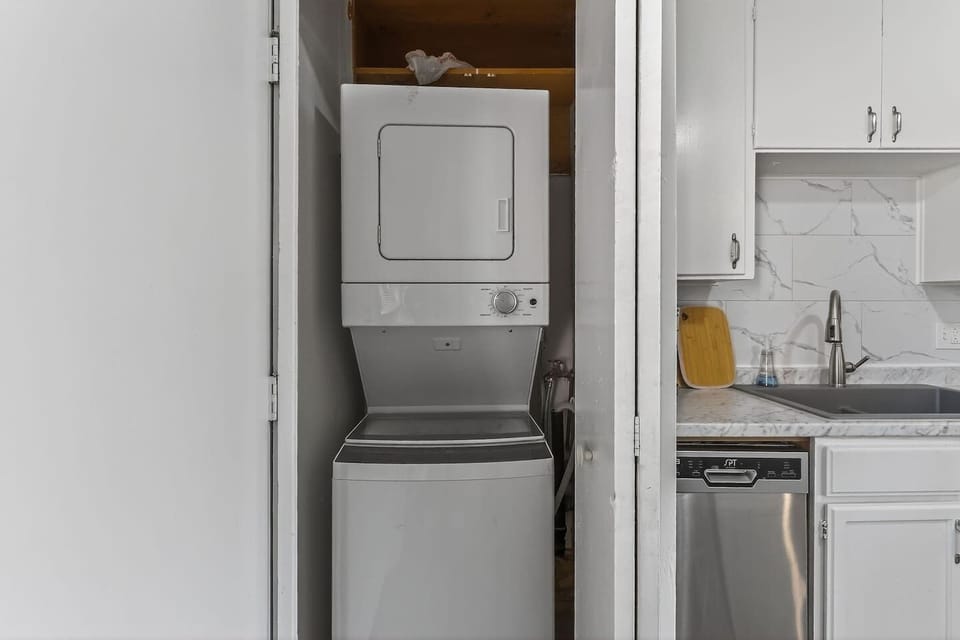 In-unit washer and dryer tucked neatly in a dedicated closet for your convenience. Perfect for longer stays or quick refreshes during your trip…no hauling laundry off-site required.