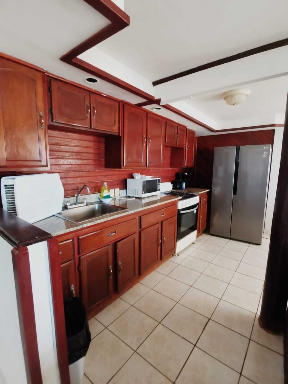 Bungalow, 3 Bedrooms, Beach Front | Private kitchen | Full-size fridge, microwave, cookware/dishes/utensils, cleaning supplies