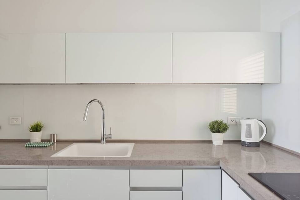 Fully Equipped Kitchen with Sleek Cabinetry