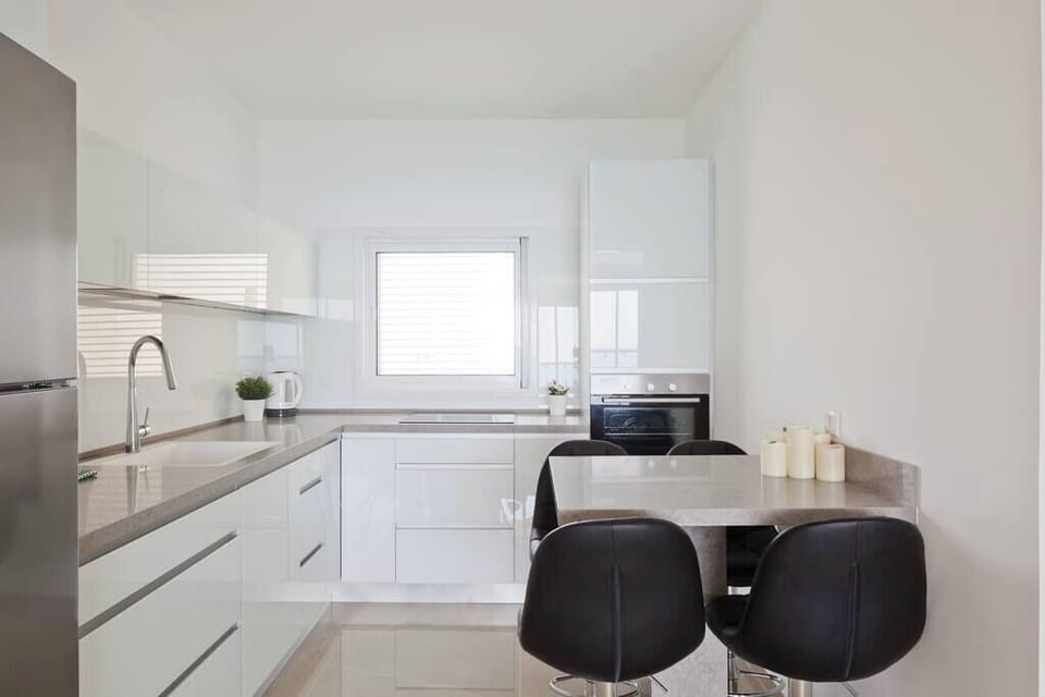 Open-Concept Kitchen with Island & Dining Space