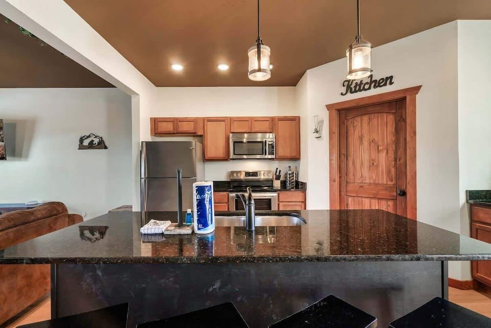 Sleek granite countertops and modern appliances make dining a delight!