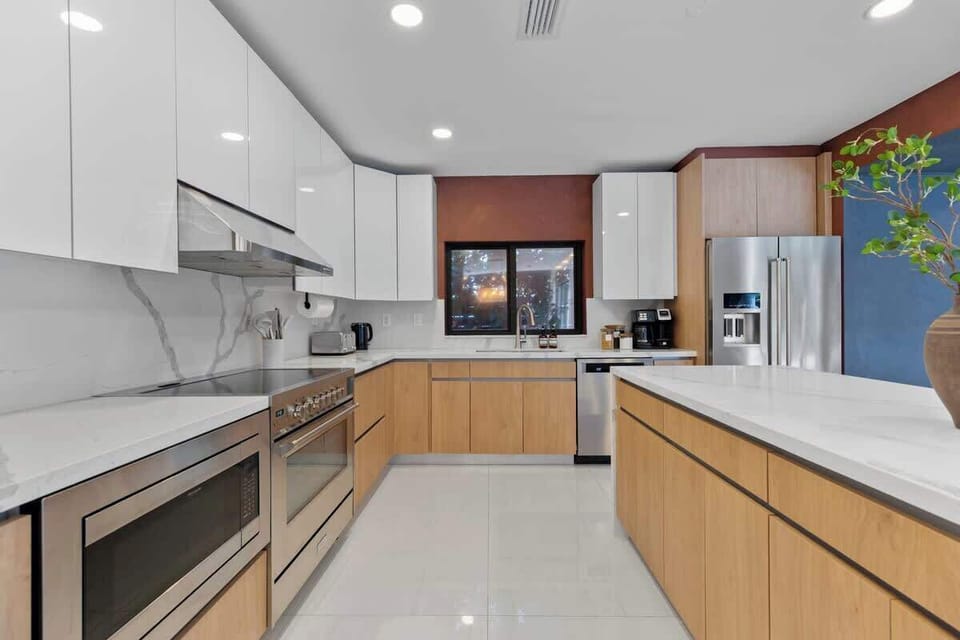 A chef-ready kitchen with sleek finishes, premium appliances, and plenty of space for cooking and gathering.
