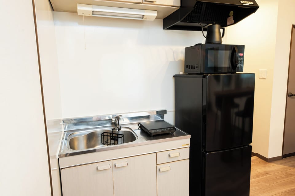 Family Room | Private kitchen | Fridge, microwave