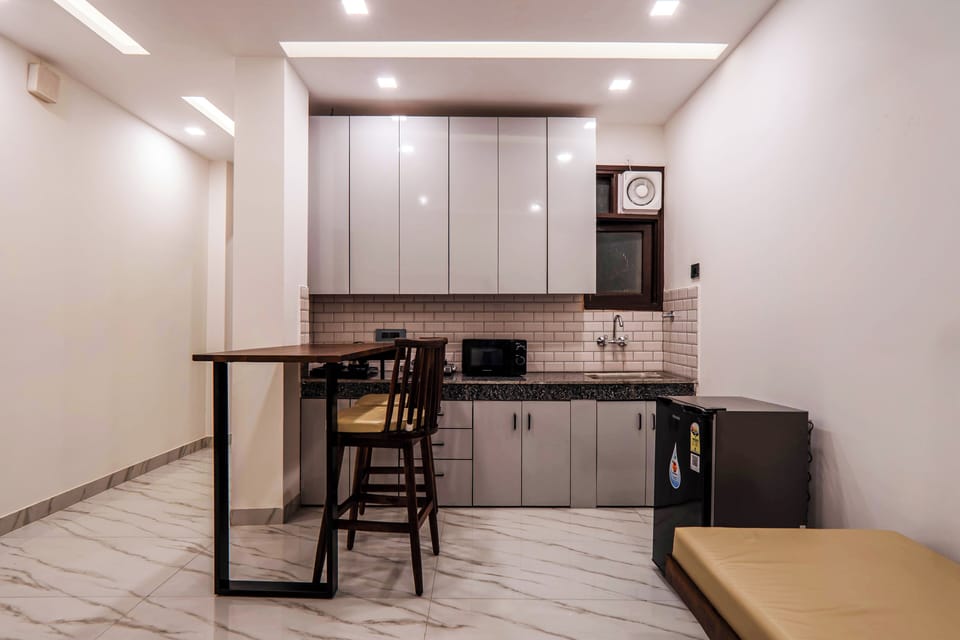 Fridge, microwave, oven, cookware/dishes/utensils