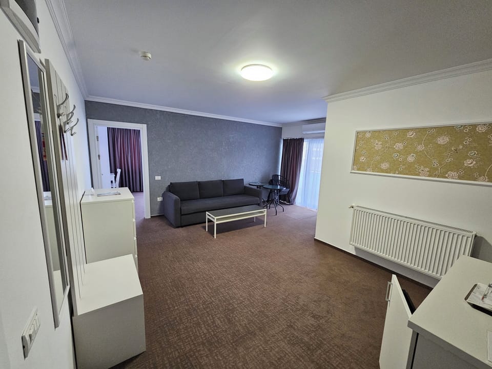 Family Apartment, Balcony, City View | Living area | TV