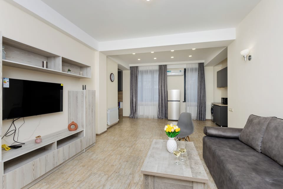 Economy Cottage | Living area | 50-inch flat-screen TV with cable channels