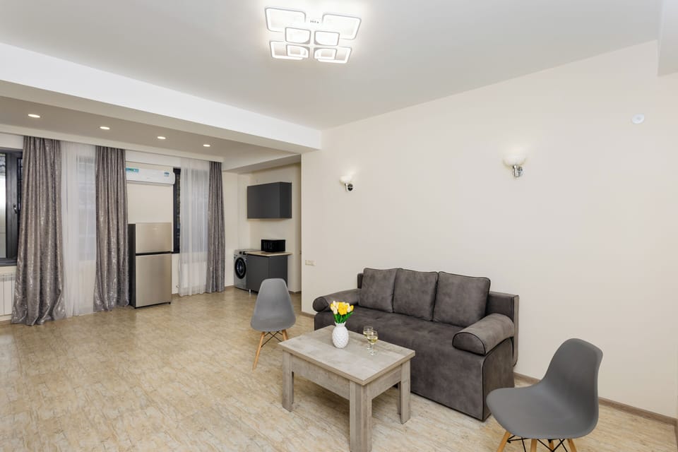 Economy Cottage | Living area | 50-inch flat-screen TV with cable channels