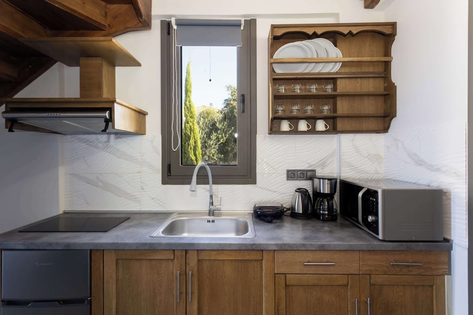 Fully stocked countertop for convenient meal prep.