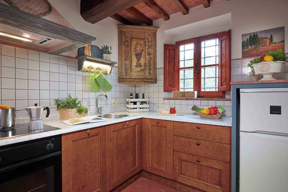 The Chianti Canonica Retreat | Private kitchen | Fridge, microwave, oven, stovetop