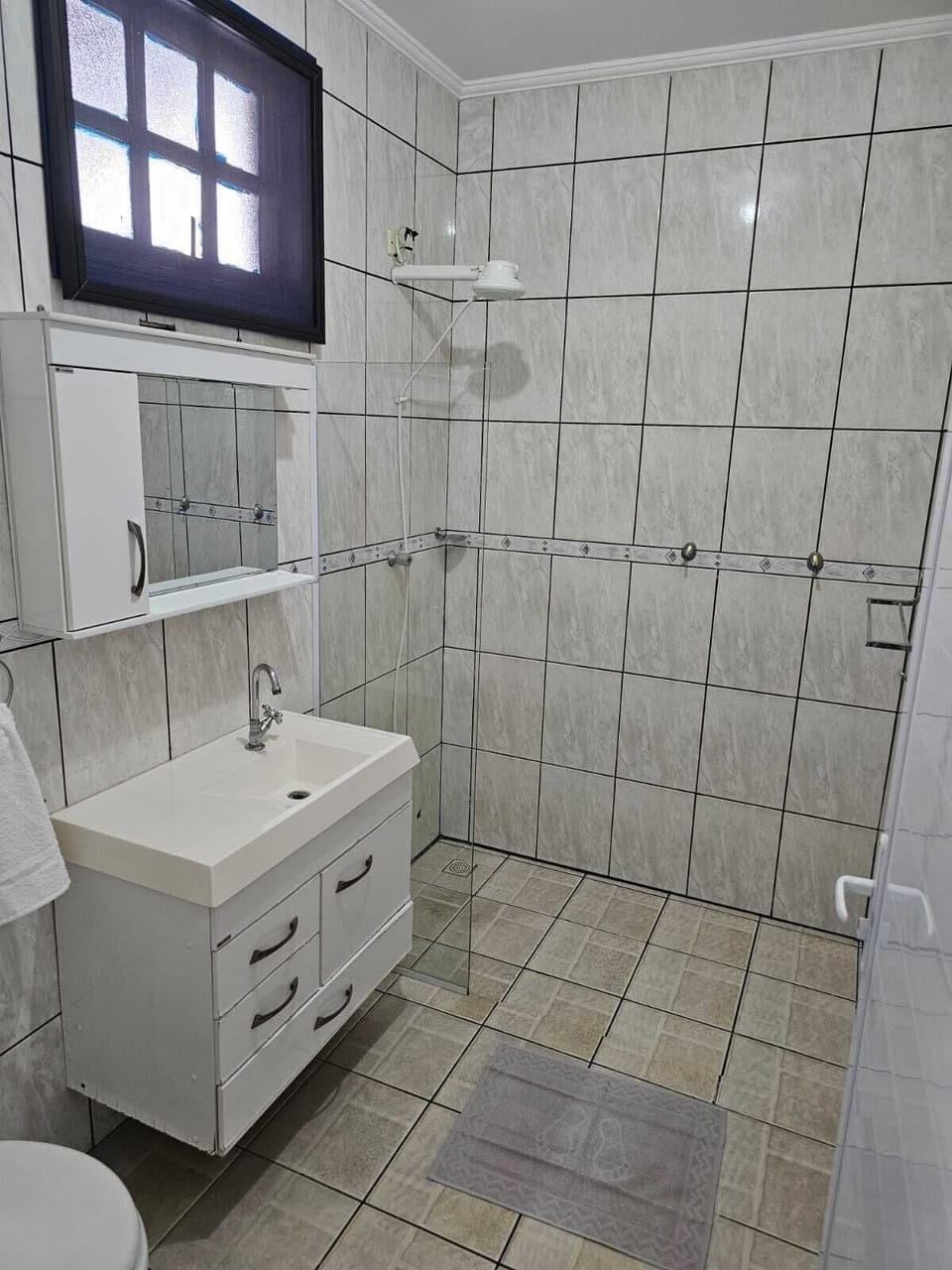 Shower, towels, soap, toilet paper