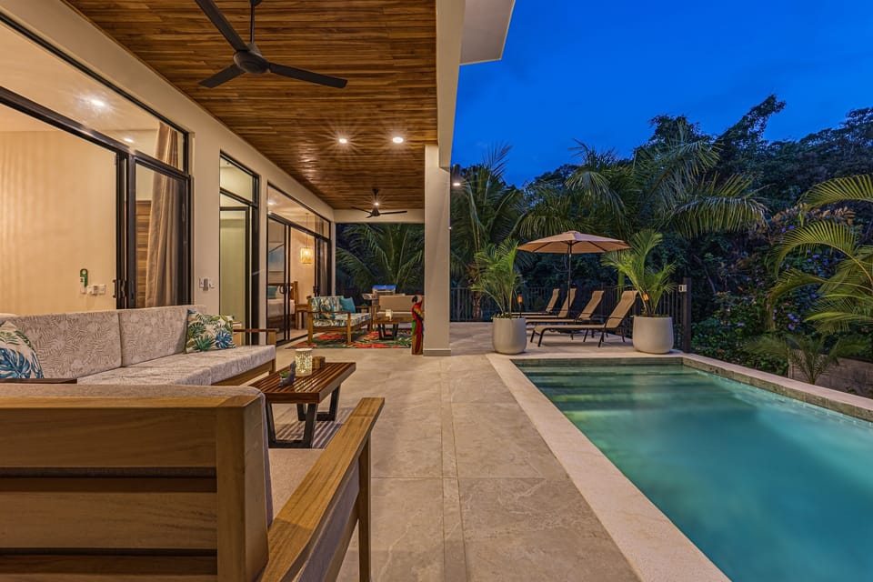 Evening swim beneath warm tropical lights