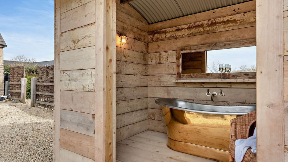 Retreat to the bath house for a long, lingering soak in the copper tub.