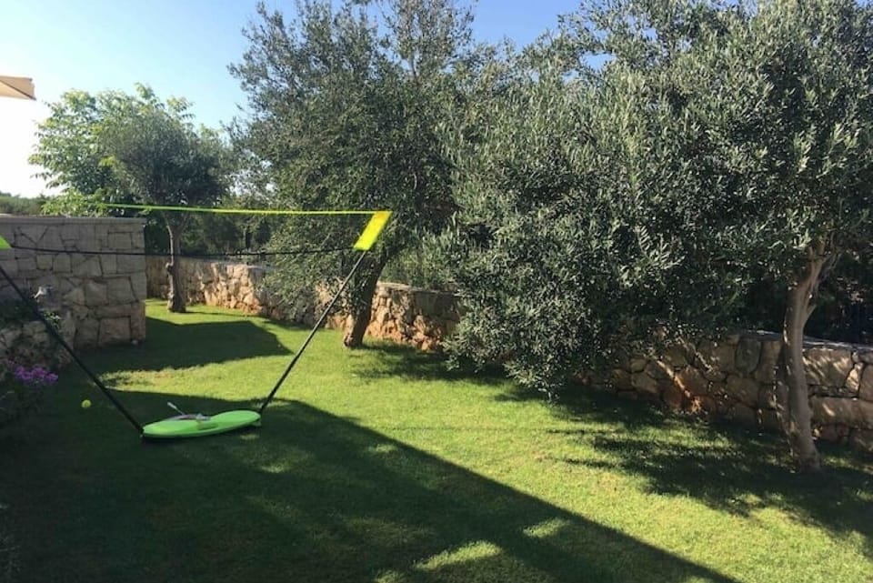 Lawn at the front of Villa Fjaka