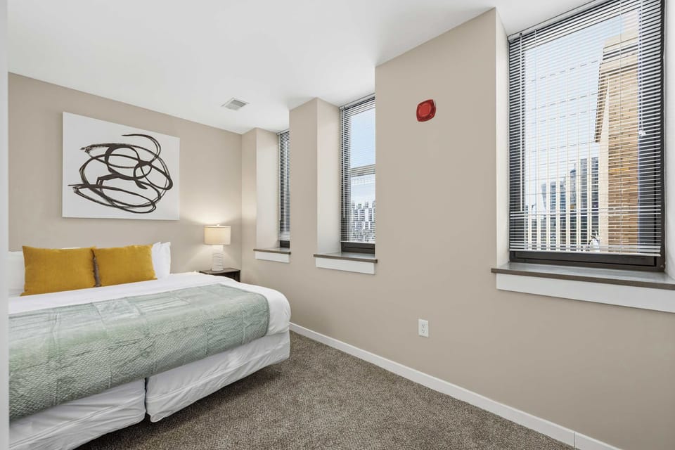 Sleek painting, lamp and windows 