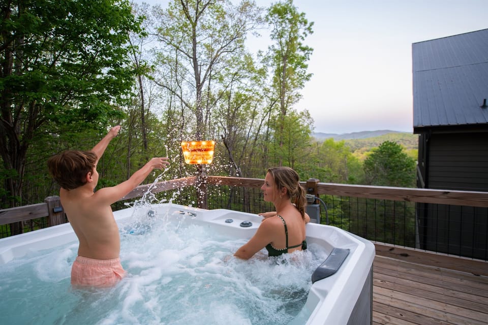 Hot Tub | Relax and unwind with panoramic mountain views