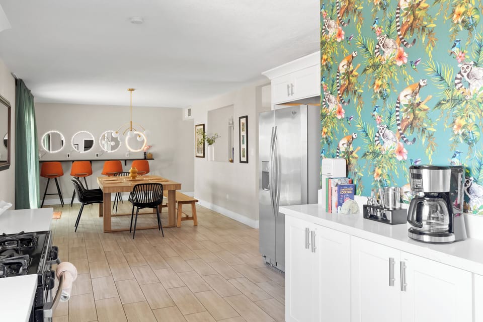The kitchen flows into the dining room, making this a great space for groups.