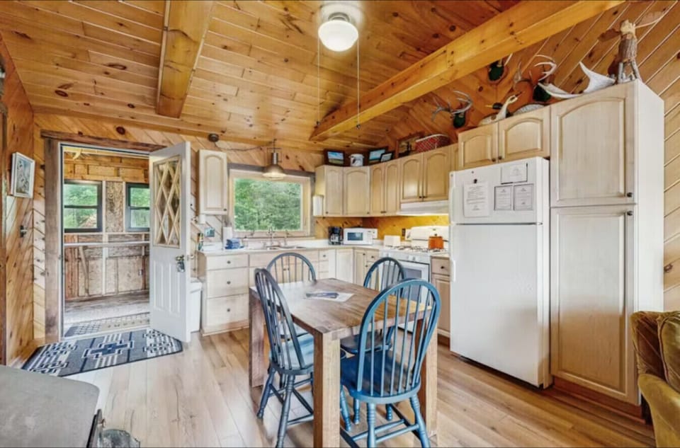 Dining area and kitchen, perfect for home-cooked meals.