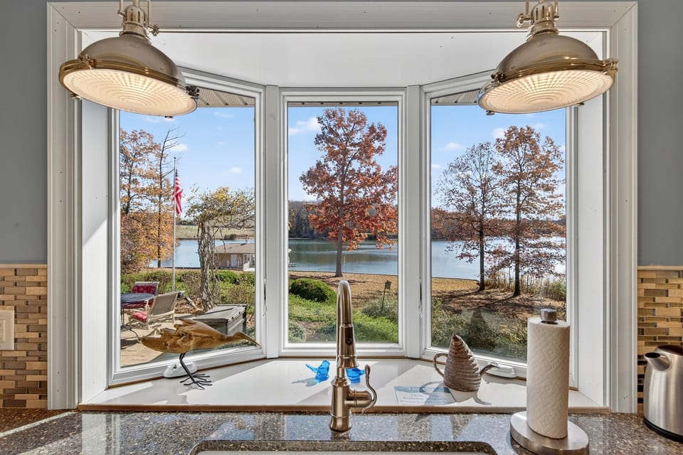 Bright kitchen with lake views right from the sink.