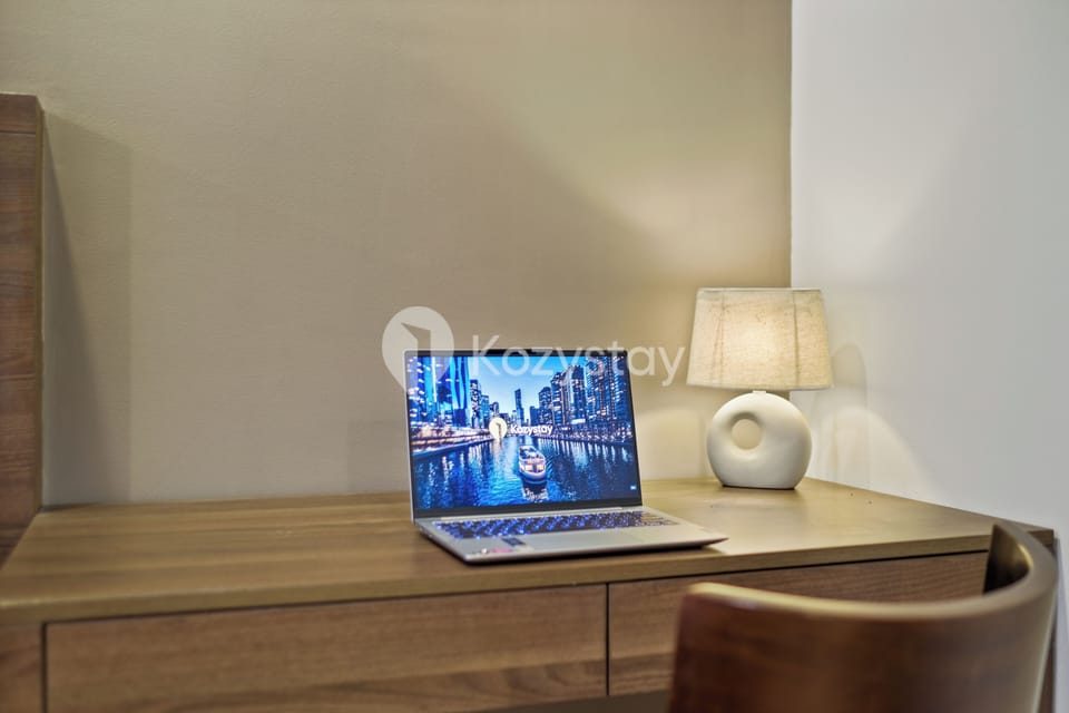 Apartment, 2 Bedrooms, City View | Desk, laptop workspace, iron/ironing board, free WiFi