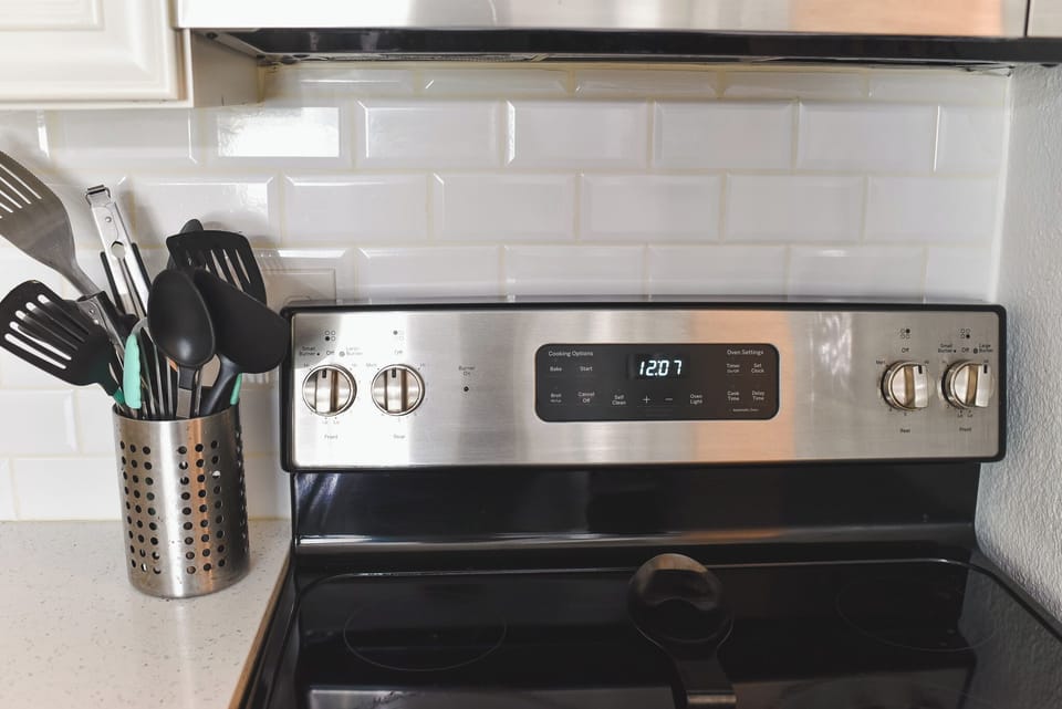 Fully equipped kitchen with appliances- ideal for extended stays and family meals.