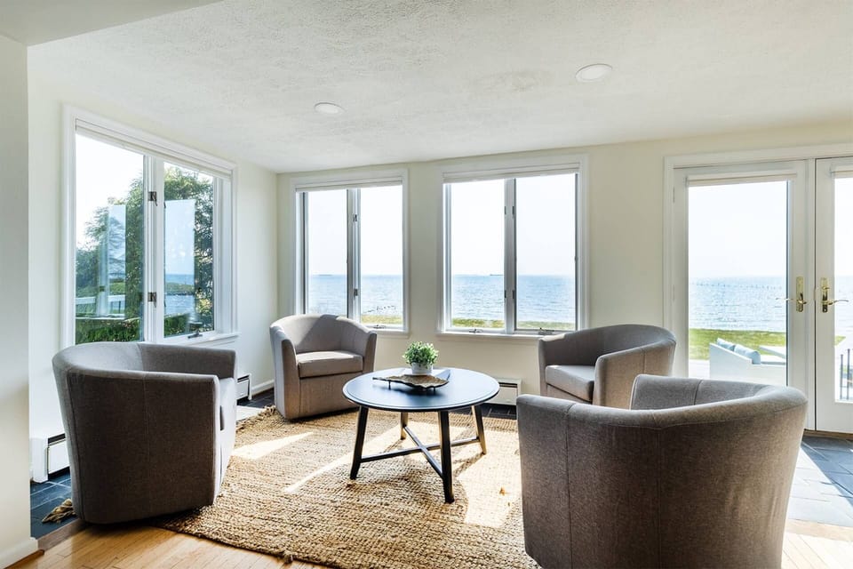 Enjoy your morning coffee and make plans for the day in the waterfront Den