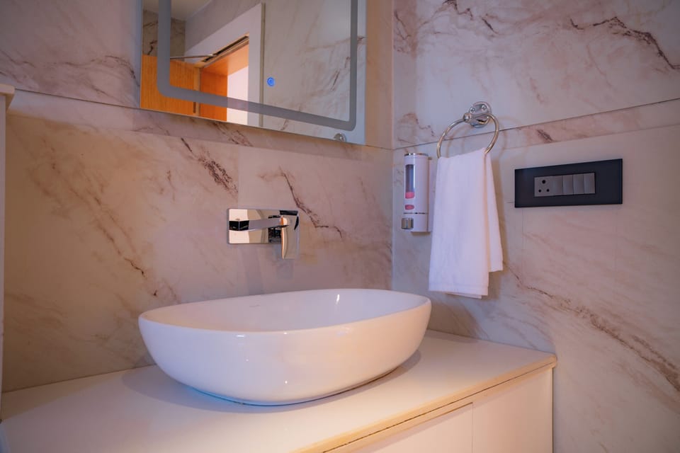 Shower, slippers, towels, soap