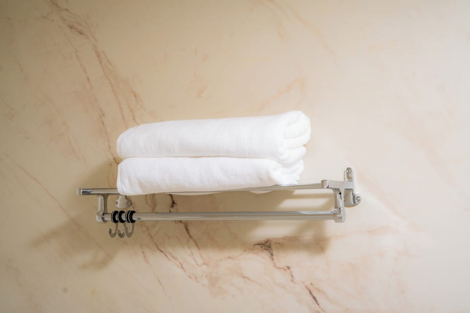 Shower, slippers, towels, soap